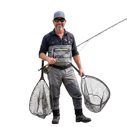 Johnny, a fishing guide, with his rod and landing nets
